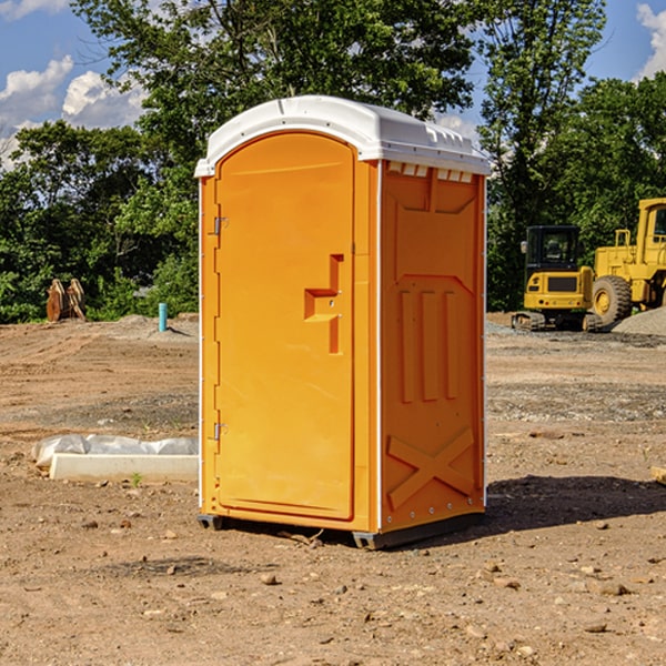 what is the cost difference between standard and deluxe portable restroom rentals in Cleora